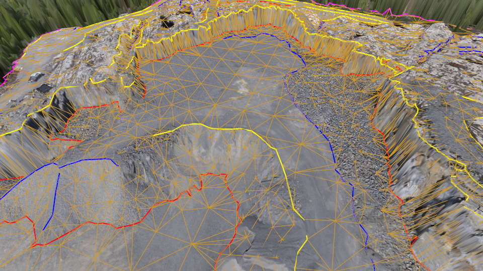 Triangulate breaklines and point grids together into a topographic surface.